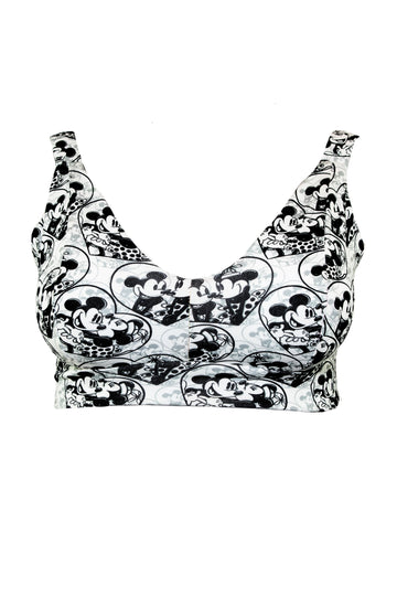 Add a dose of classic romance to your undies drawer with our Mickey and Minnie In Love Wireless Comfort Bra. This nostalgic print is all about soft support, sweet vibes, and a little cartoon chaos. Featuring the iconic couple in cute, flirty moments, this bra brings a playful touch to your everyday comfort.

Designed for F to O cup sizes, it’s wire-free, tag-free, and made from soft organic cotton — ideal for sensory-friendly wear. Gender inclusive and handmade in Scotland, it’s perfect for anyone who wants