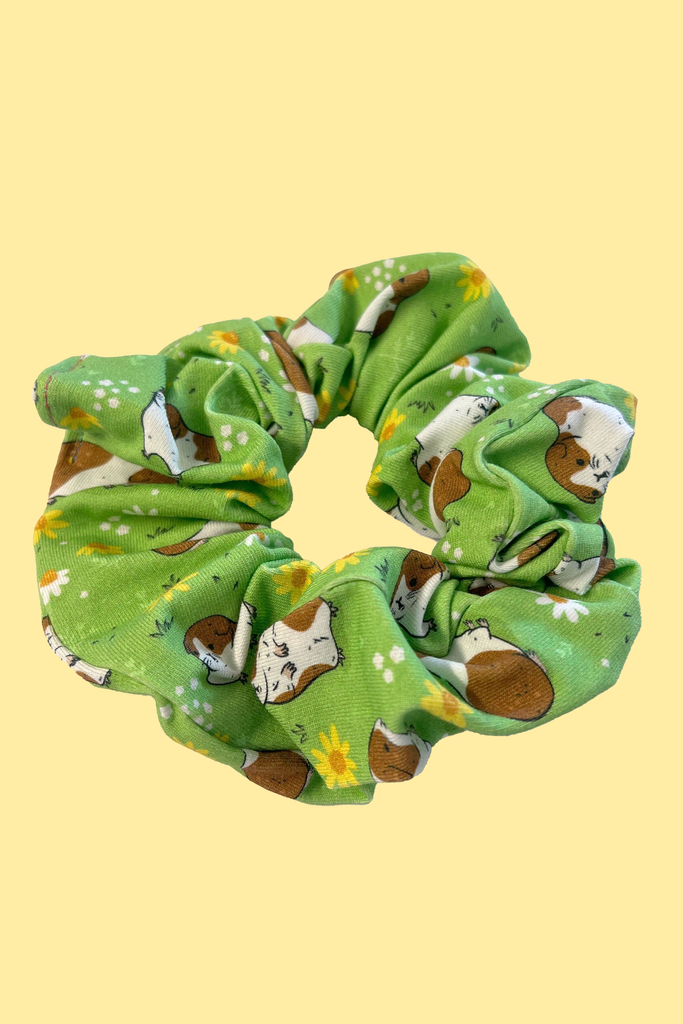 Cute green hair scrunchie with guinea pig print. Sustainably made from fabric off-cuts from Wilde Mode Active and Loungewear collections 